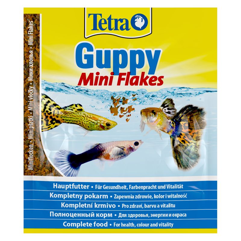 Корм для рыб TETRA Guppy для гуппи,пецилий,меченосцев и живород.пицилиевых,в хлоп. 12г(пакетик) фото